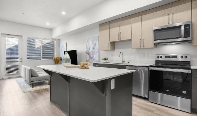 a kitchen with a large island